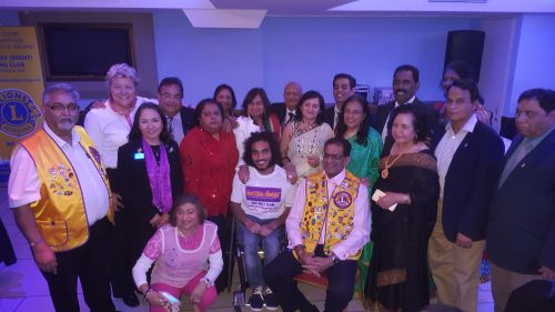 Members of Wembley Lions club with Shaikh